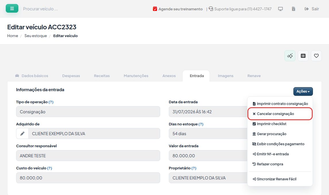Ficha do veículo consignado, aba Entrada, com o menu Ações aberto e a opção Cancelar consignação destacada.